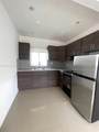 560 67th St - Photo 2