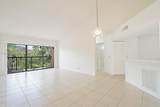 9033 Wiles Rd - Photo 19