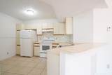 9033 Wiles Rd - Photo 6