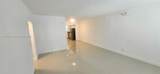 1050 98th St - Photo 3