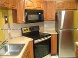 900 209th Ter - Photo 1