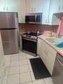 855 209th St - Photo 5