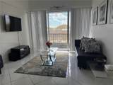 8821 Flagler St - Photo 2