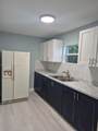 1231 101st St - Photo 2