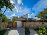 7749 100th St - Photo 1