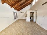 7749 100th St - Photo 2