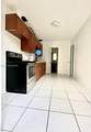 233 199th Ter - Photo 5