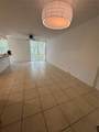 210 172nd St - Photo 1
