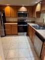 100 130th Ter - Photo 2