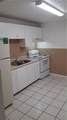 5880 19th Ct 1-3 - Photo 2