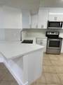 8801 Wiles Rd - Photo 5
