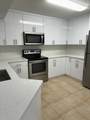 8801 Wiles Rd - Photo 6
