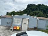 1487 100th St - Photo 2