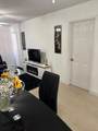 1750 56 St - Photo 2