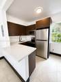 551 62nd St - Photo 2