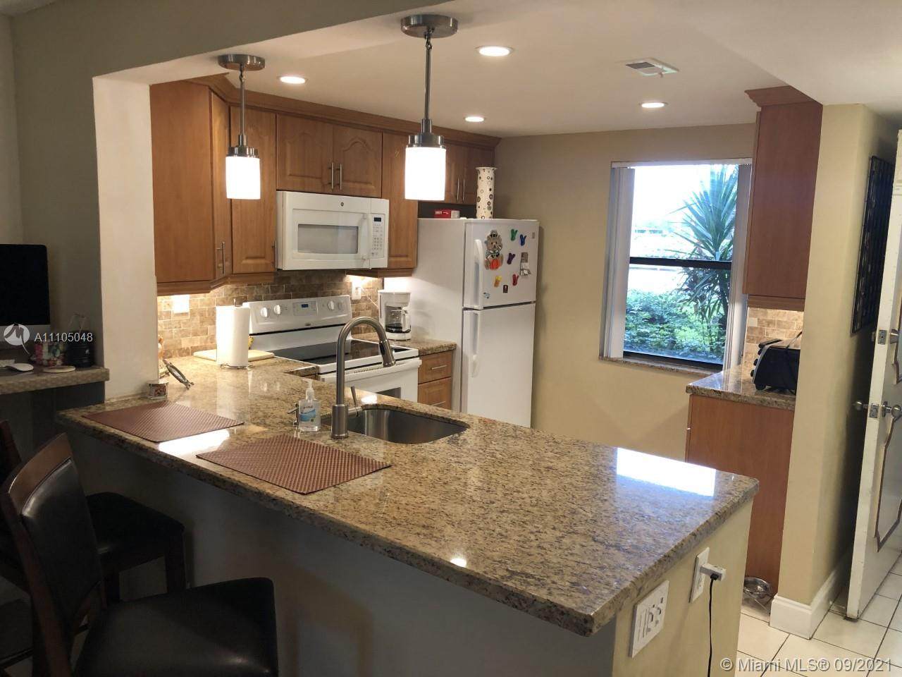 7750 Mcnab Rd - Photo 1