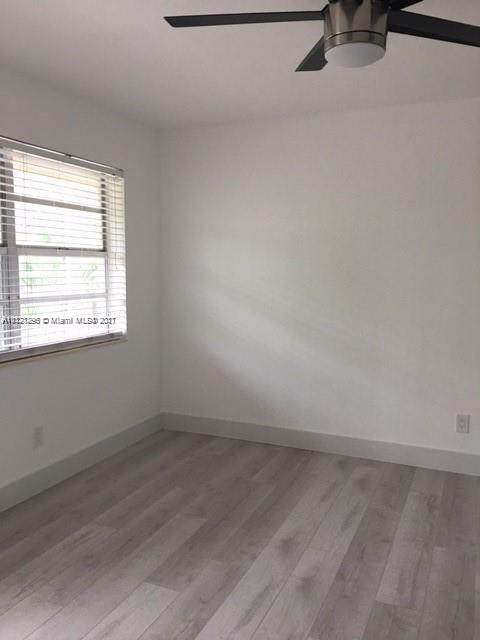 645 77th St - Photo 1