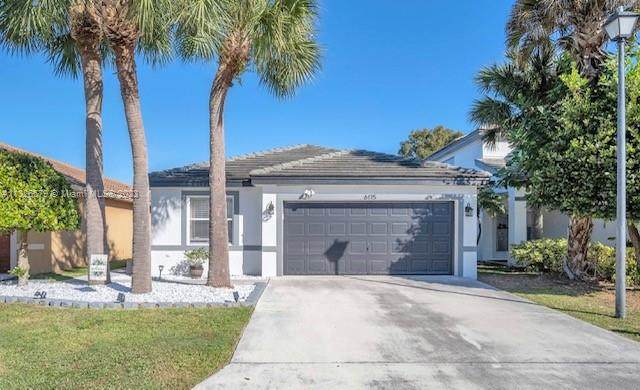 6115 Spring Isles Blvd - Photo 1
