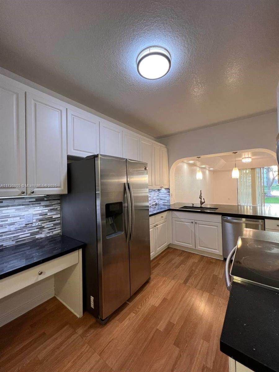 10710 66th St - Photo 1