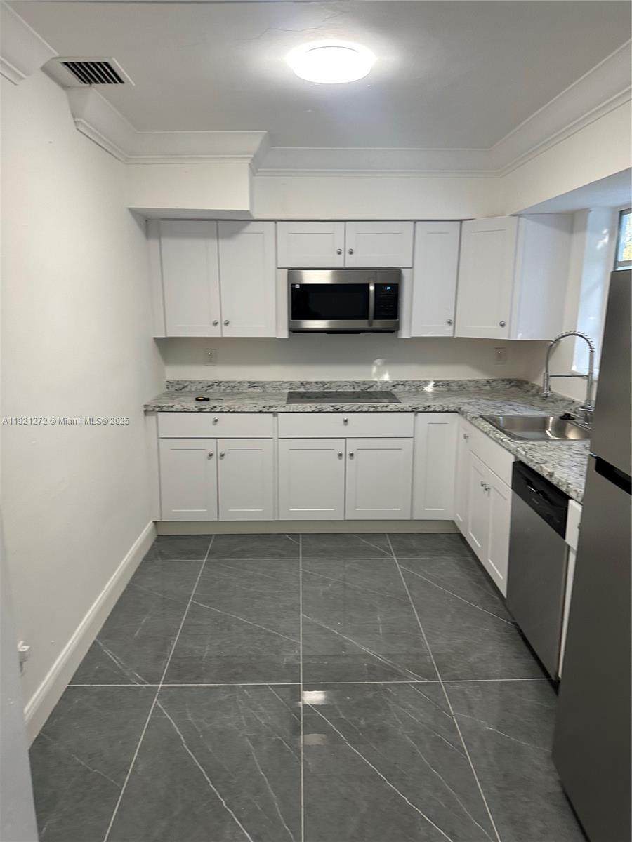 102 122nd St - Photo 1