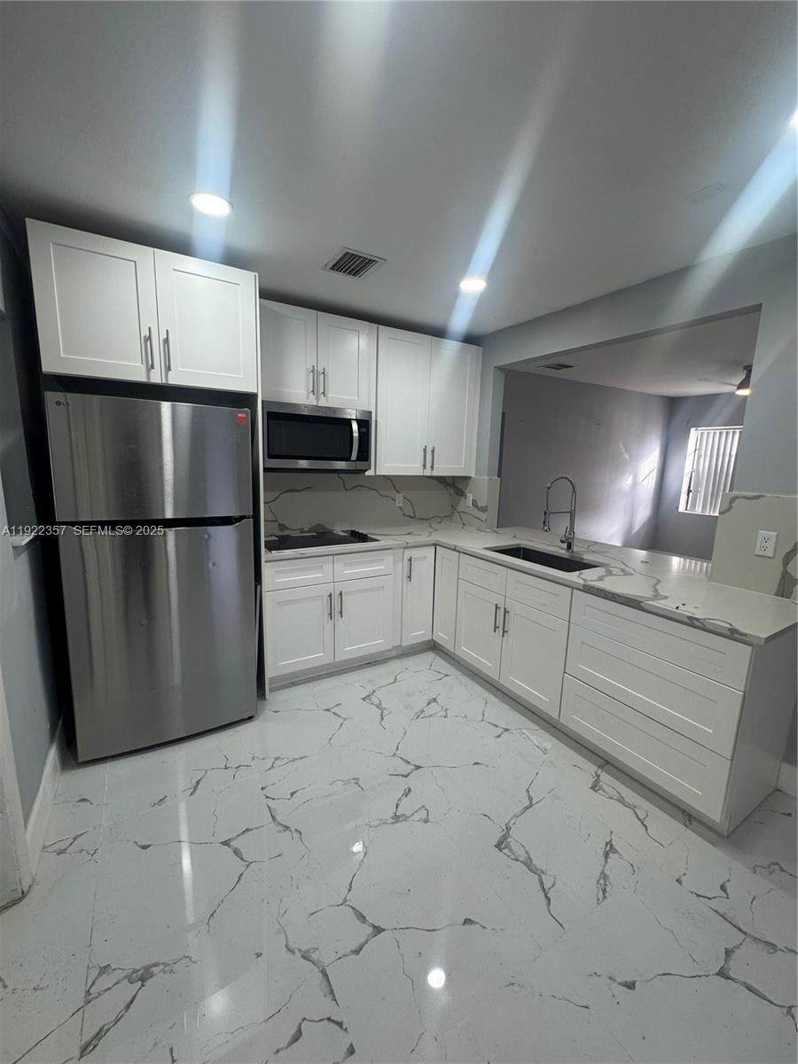 1171 161st Ter - Photo 1