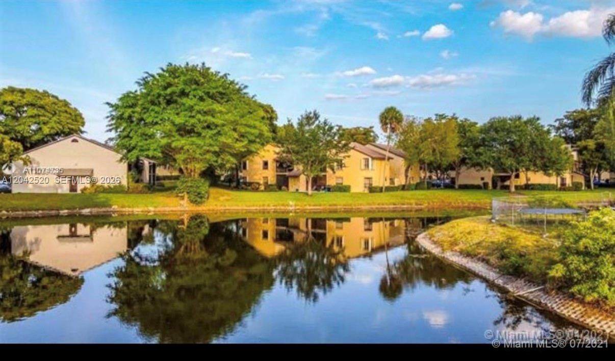 3833 Cocoplum Cir - Photo 1