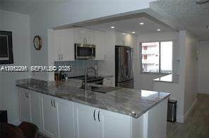 https://bt-photos.global.ssl.fastly.net/miami/orig_boomver_1_A12052298-2.jpg