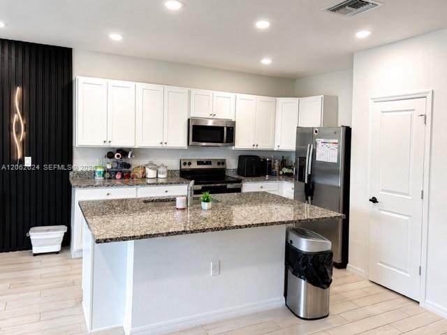 https://bt-photos.global.ssl.fastly.net/miami/orig_boomver_1_A12062624-2.jpg