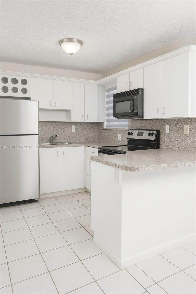 8170 10th St - Photo 1