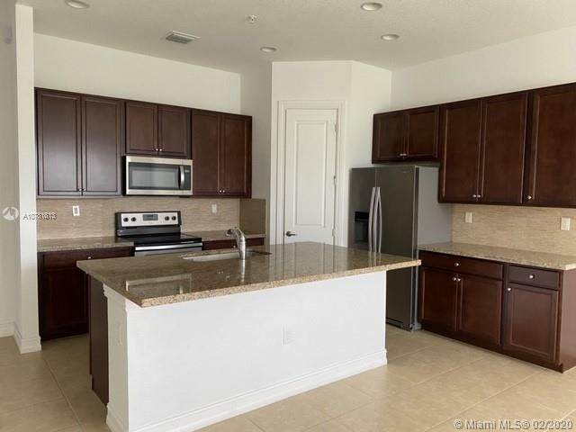 11524 16 St - Photo 1