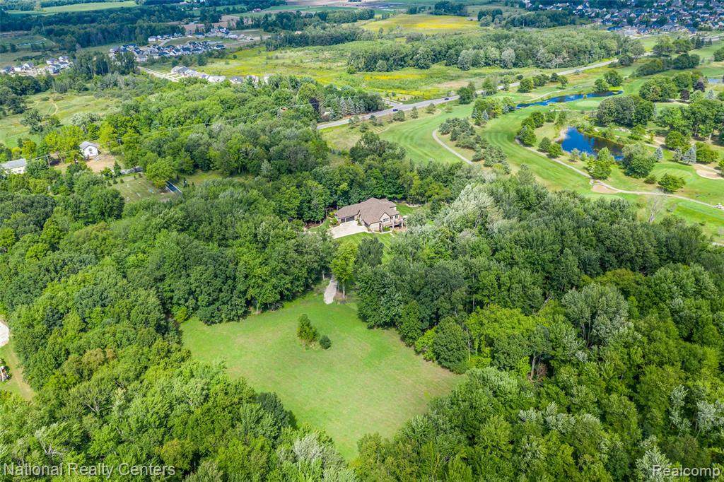 56399 10 MILE Road - Photo 1
