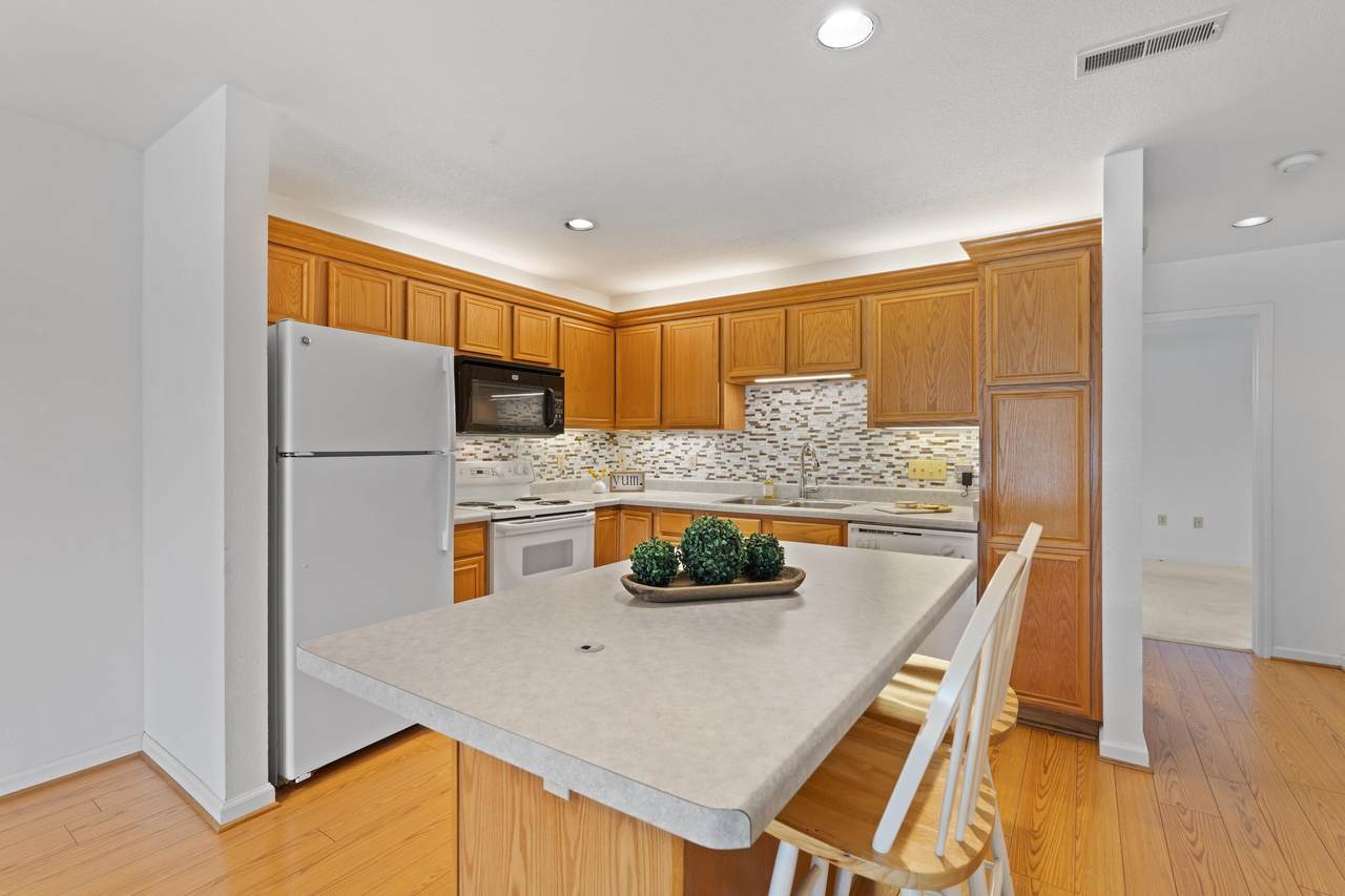 N16W26573 Tall Reeds Ln - Photo 1