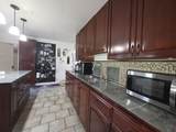 1567 100th St - Photo 3