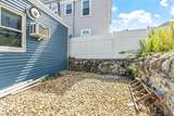 127-129 Lowell St - Photo 10