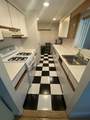 11 Story - Photo 1
