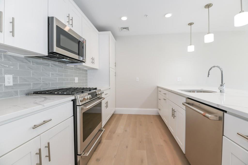 545 East Third - Photo 1