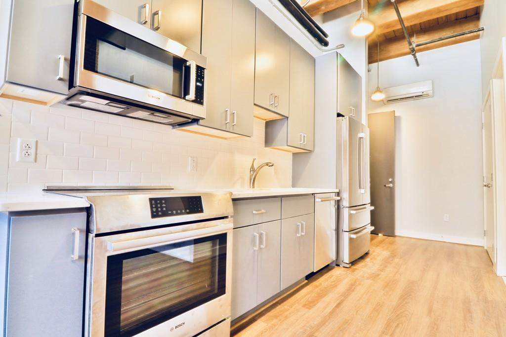 63 Melcher - Photo 1