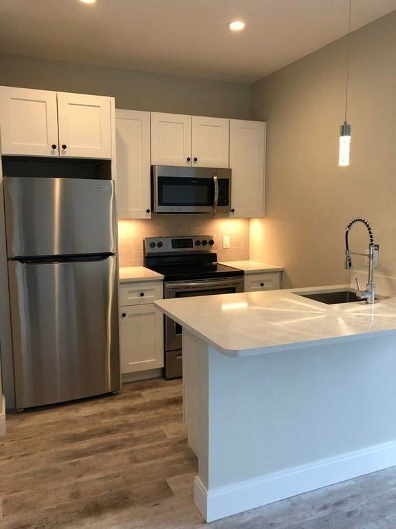 1457 Tremont St - Photo 1