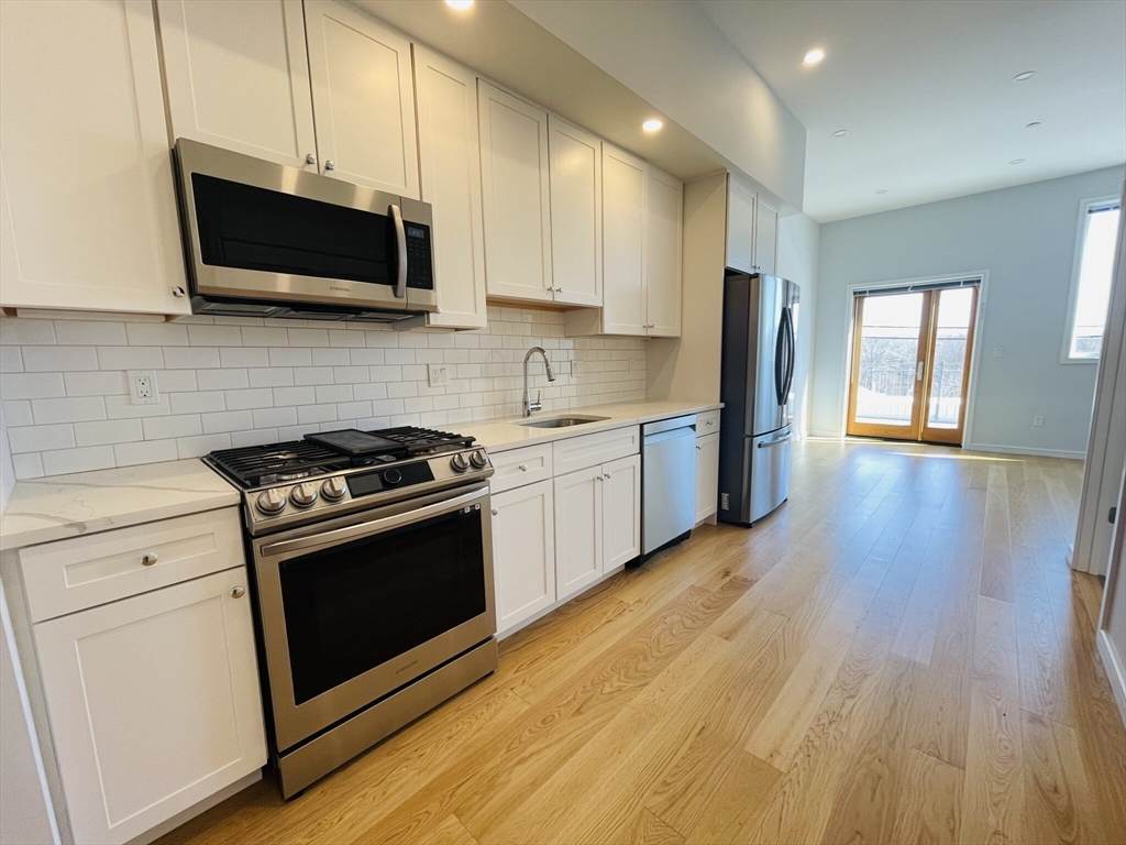 385 Pleasant St - Photo 1