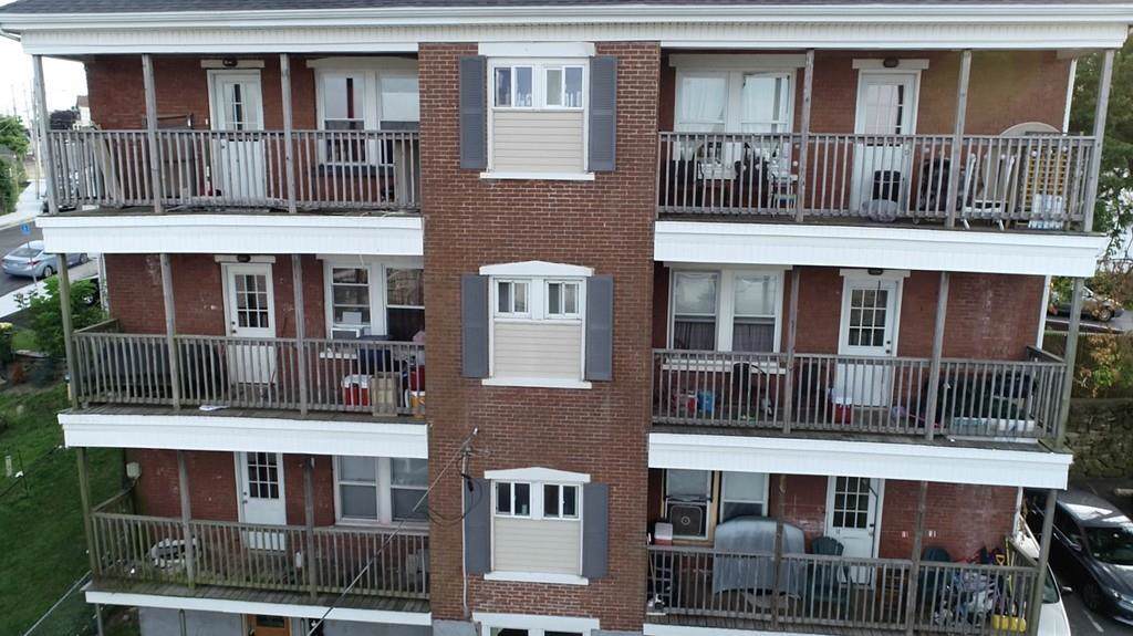 181-187 Nashua St - Photo 1