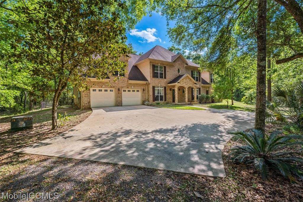 4900 Whispering Oaks Lane - Photo 1