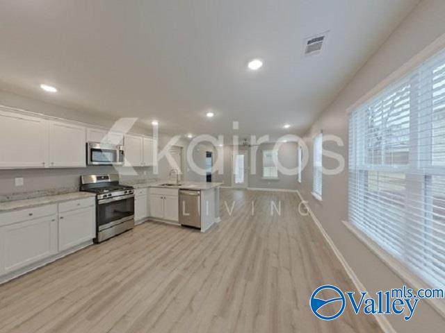 https://bt-photos.global.ssl.fastly.net/nalmls/orig_boomver_1_21927555-2.jpg