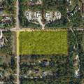  8 Ave Ne/ Everglades Blvd N - Photo 1