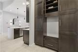 711 91st Ave - Photo 21