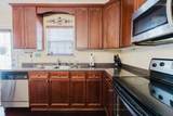 7033 Sunnywood Dr - Photo 6