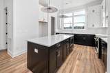 107 E 9th St - Photo 4