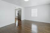 319 E 17th St - Photo 6