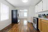 319 E 17th St - Photo 7