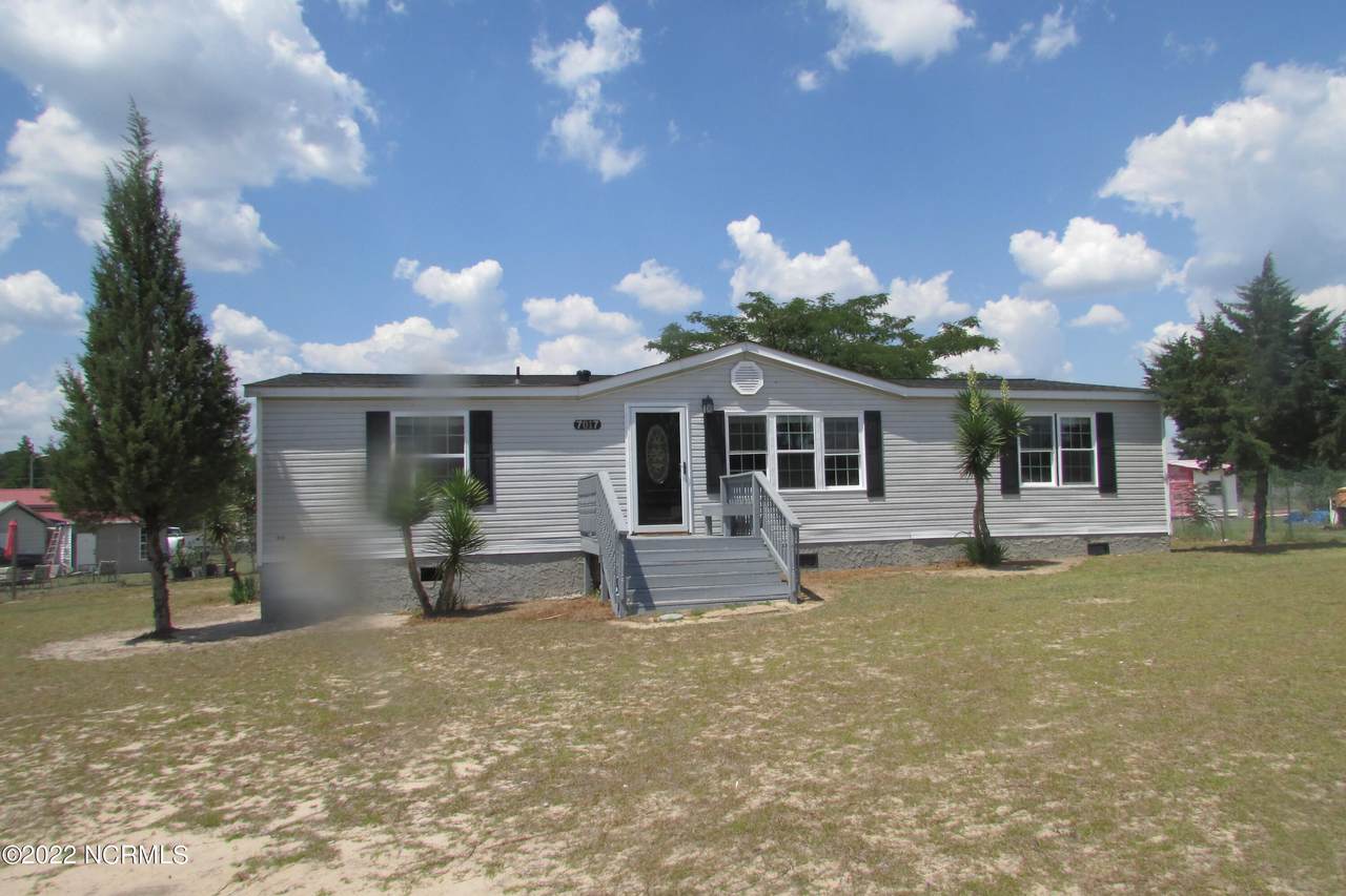 7017 Twisted Oaks Drive - Photo 1