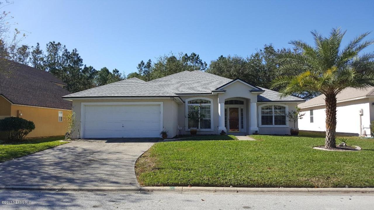8716 Canopy Oaks Dr - Photo 1